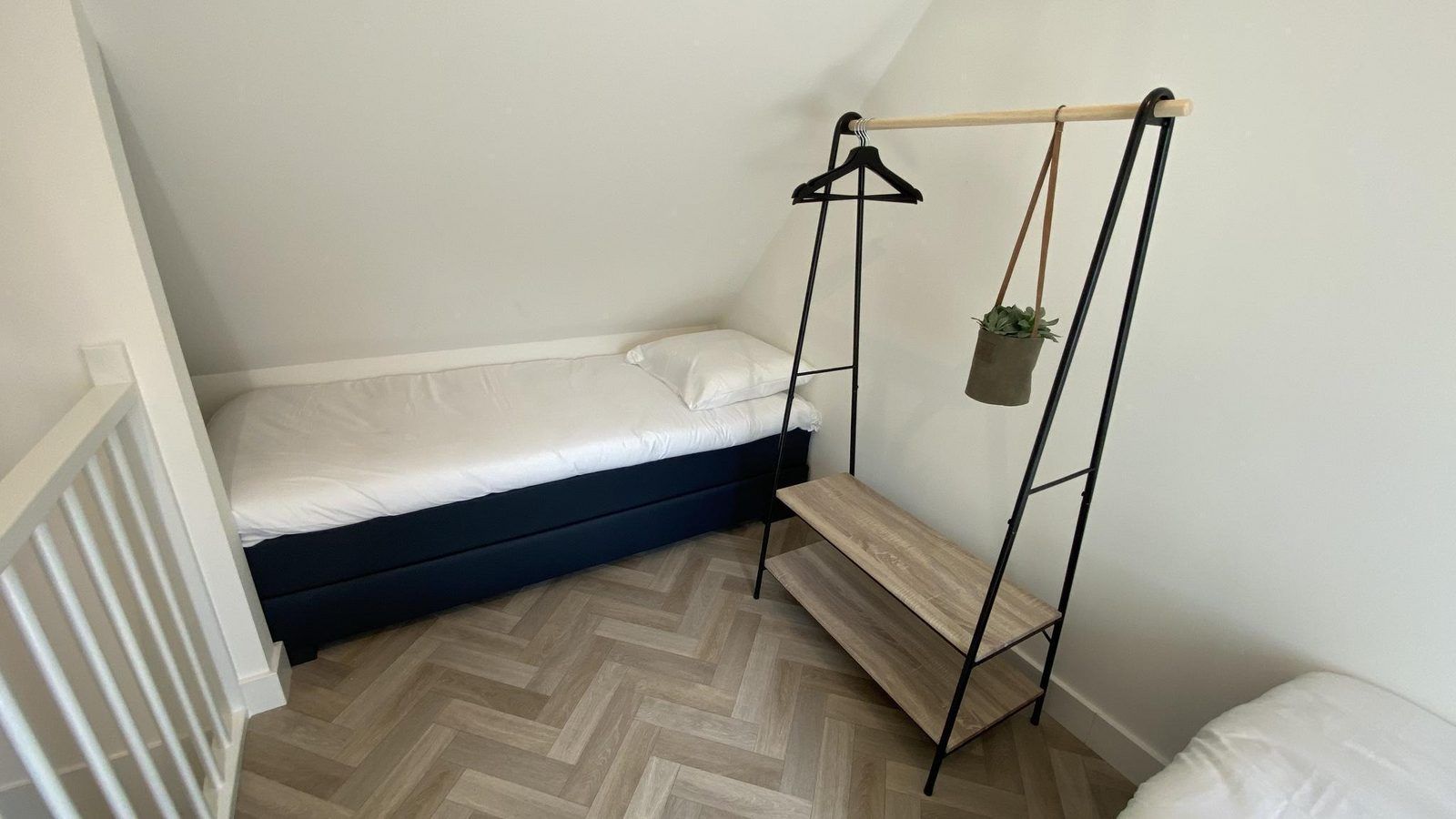 Bedroom with two single beds in VZ1022 Holiday apartment in Veere, Walcheren, Zeeland.