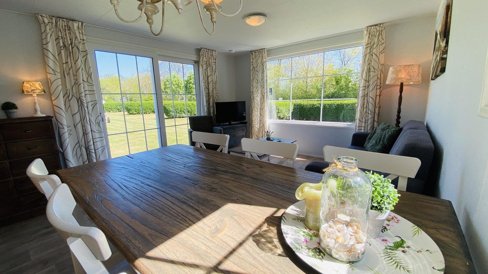 Dining area in VZ235 Chalet Veere in Veere, Zeeland with garden view