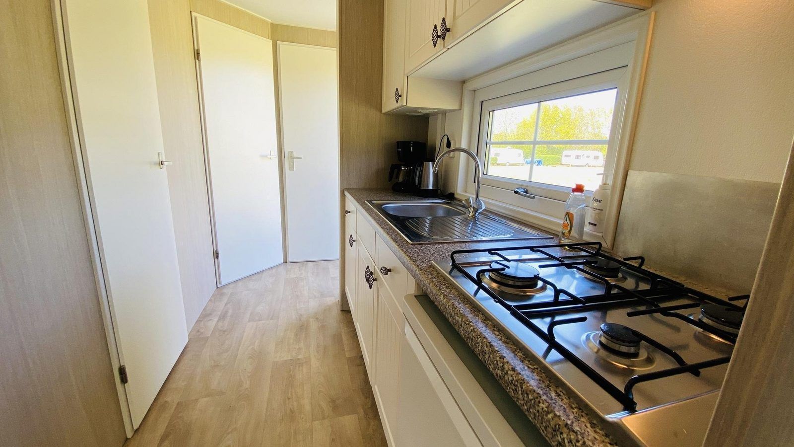 Compact kitchen in VZ235 Chalet Veere in Veere, Zeeland with stove