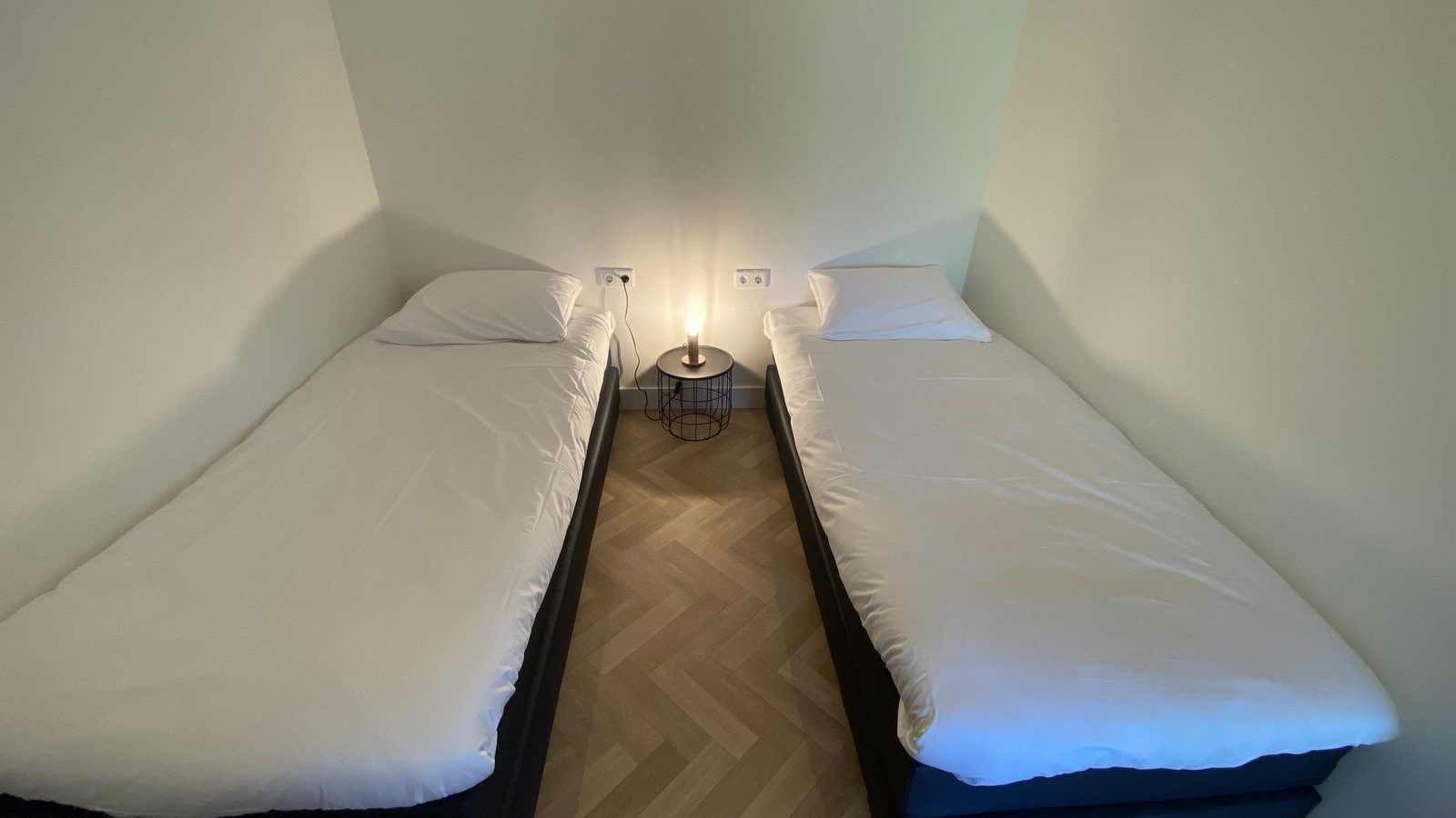 Bedroom with modern interior in VZ1064 Luxury vacation apartment in Veere, Walcheren, Zeeland.