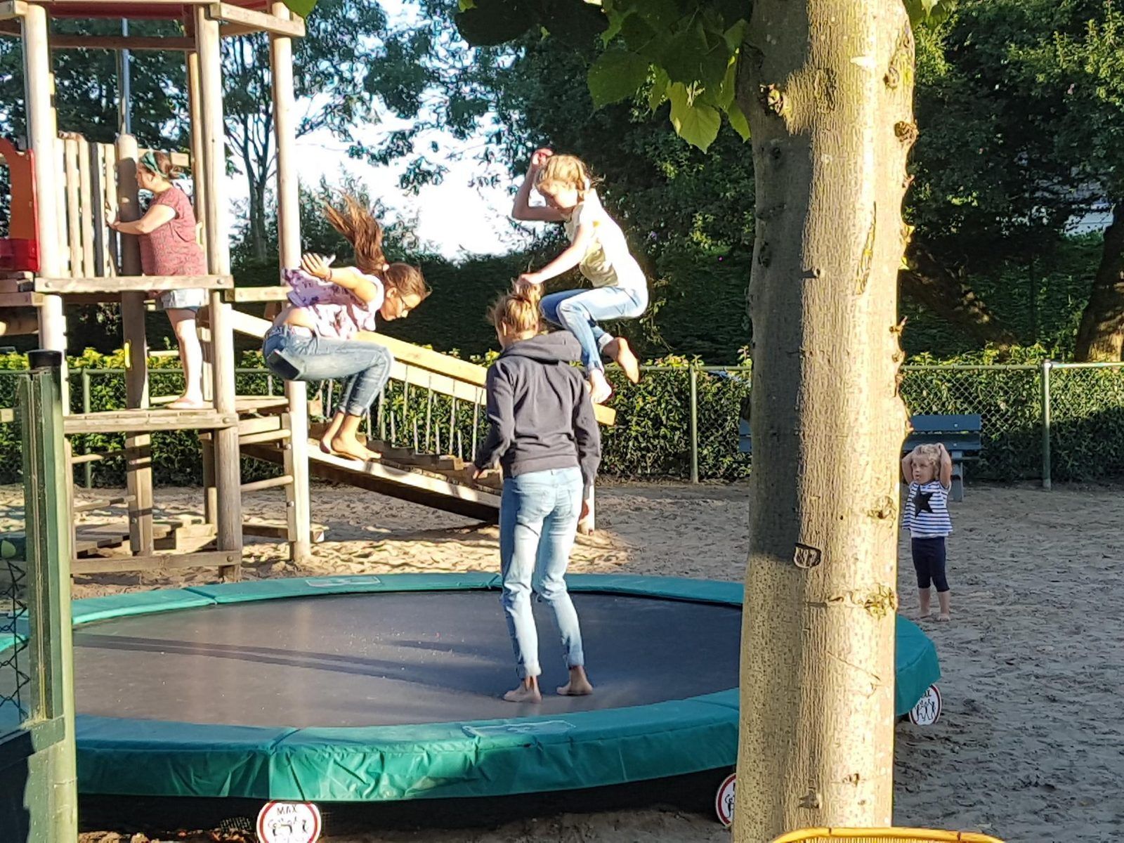 Playground fun at VZ824 Chalet in Veere, Serooskerke, Walcheren, with trampoline and climbing facilities.