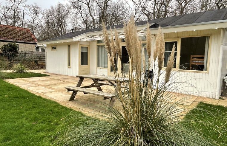 Cozy terrace at Holiday home in Dishoek, Walcheren, with green surroundings.