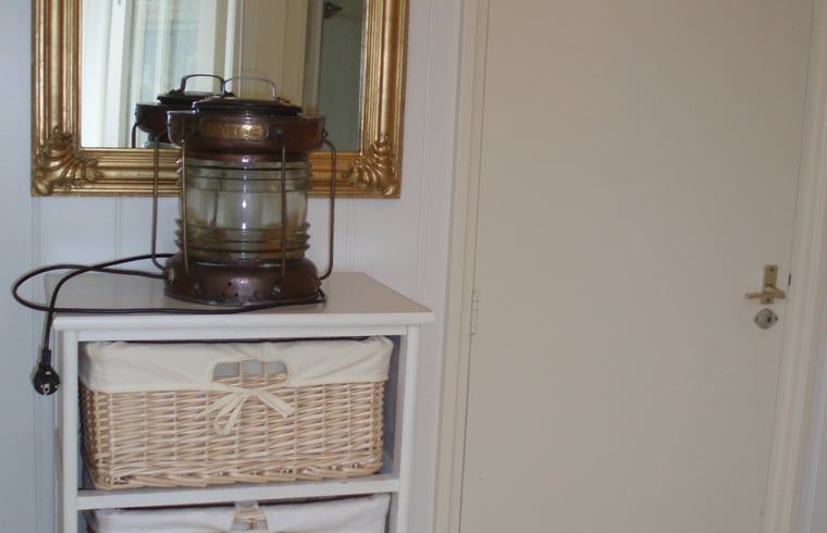 Decorative corner with mirror in Holiday home in Dishoek, Walcheren, Zeeland.