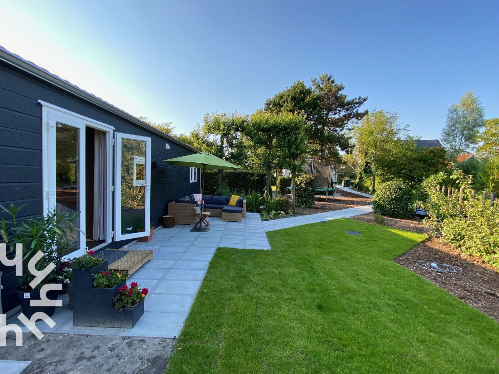Enjoy the sunny garden of vacation home ZE1415 in Gapinge, Walcheren, Zeeland.