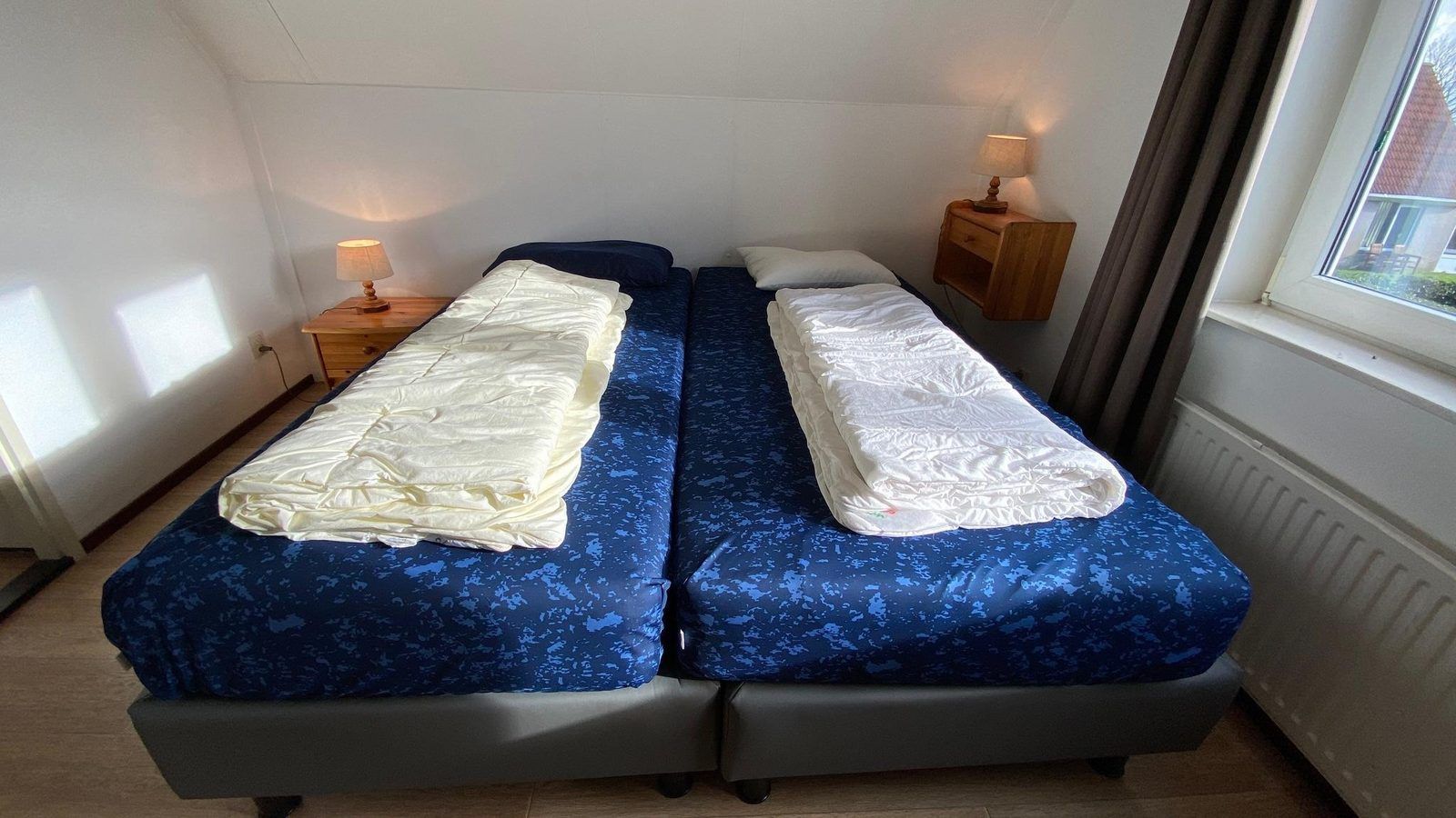 Bright bedroom in VZ921 Holiday home in Cadzand-Bad, Zeeuws-Vlaanderen, with two beds.