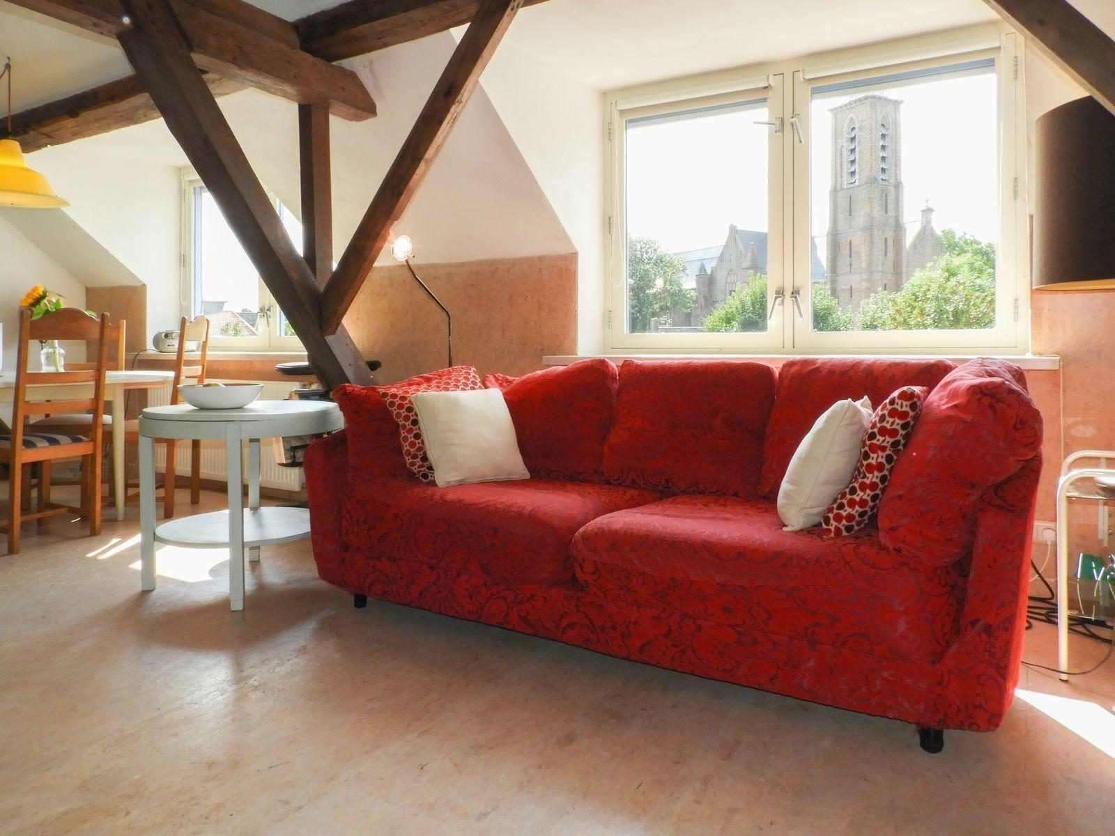 Cozy sitting area with a view in VZ052 Apartment Sluis, Sluis, Zeeuws-Vlaanderen.
