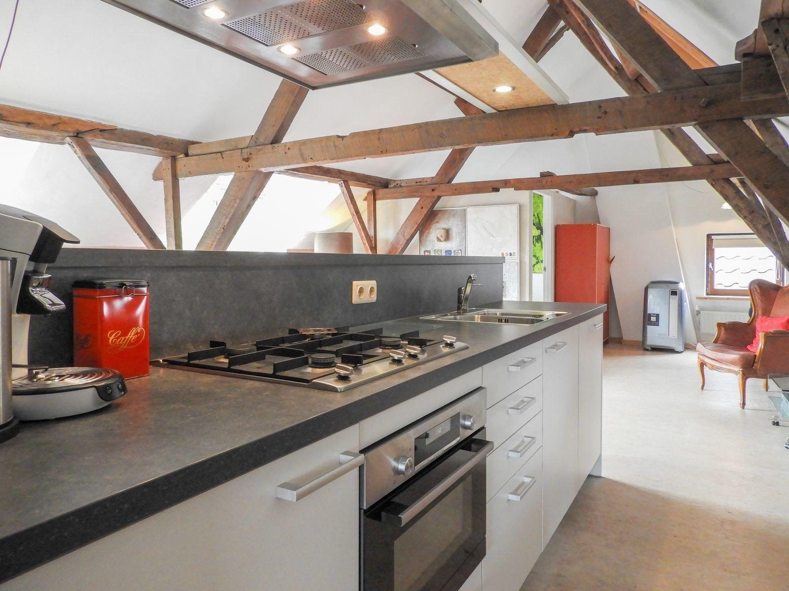 Kitchen with wooden beams in VZ052 Apartment Sluis, Sluis, Zeeuws-Vlaanderen.