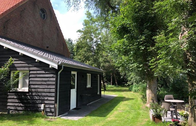 Charmantes Ferienhaus Cottage in Axel in Zeeuws-Vlaanderen mit gruenem Garten und Terrasse.