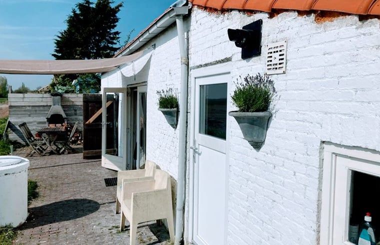 Vakantiehuis in Walsoorden met sfeervol terras, ideaal voor een verblijf in Zeeuws-Vlaanderen, Zeeland.