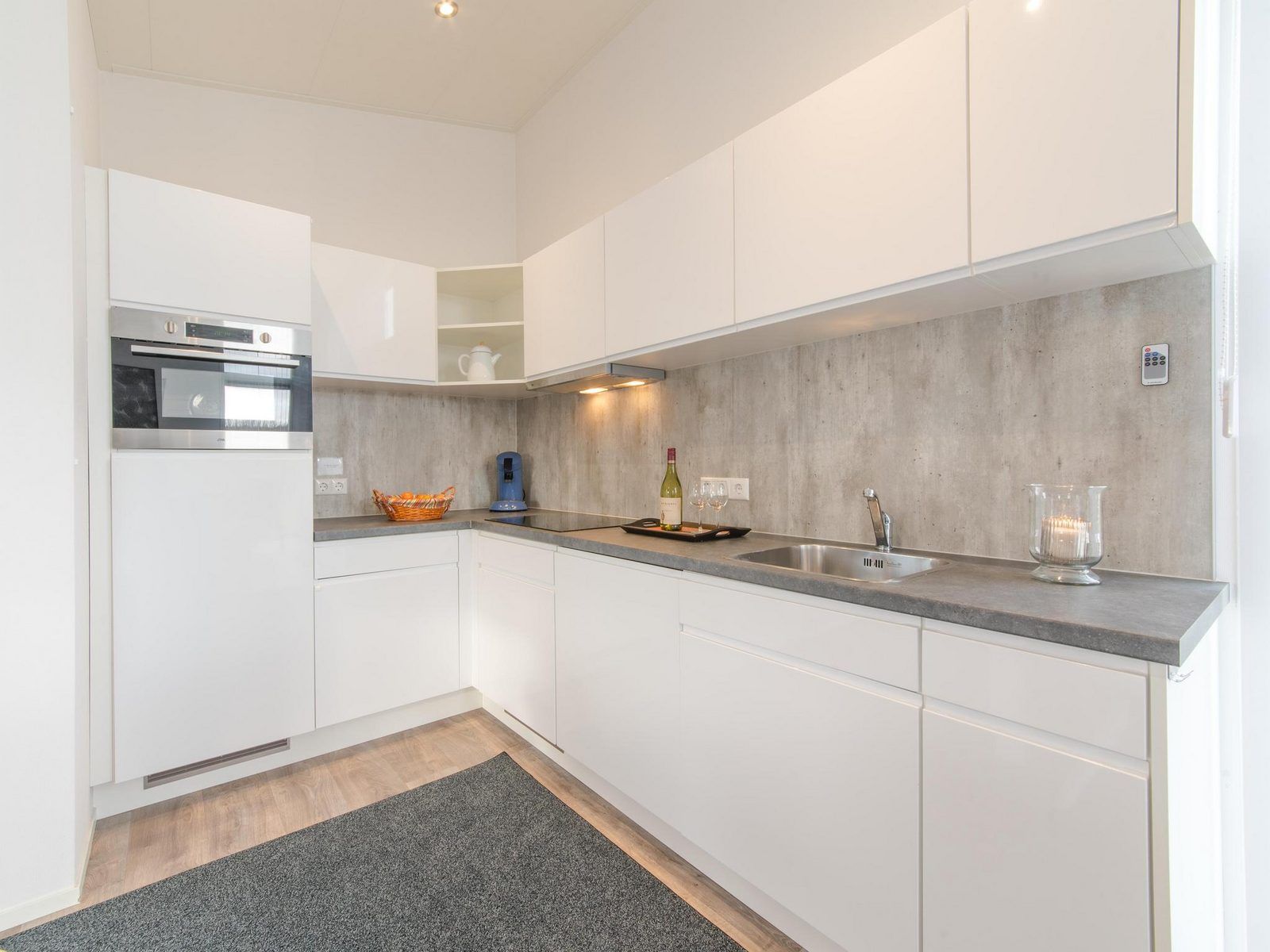 Modern kitchen in Holiday home Waterresort Oosterschelde - house no. 38 in Wemeldinge, fully equipped for cooking.