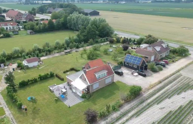 Aerial photo of Huisje in Lewedorp, a vacation home surrounded by nature in South Beveland, Zeeland.