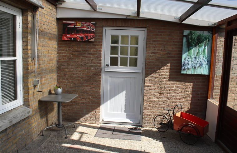 Cozy porch of Cottage in Lewedorp, a fine place in South Beveland, Zeeland.