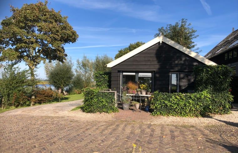 Aussenansicht von Cottage in Brandwijk, einem charmanten Ferienhaus in Alblasserwaard, Suedholland.