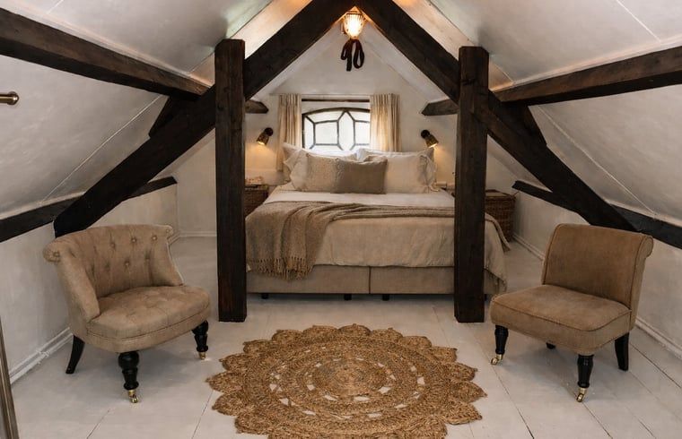 Spiral staircase in Cottage in Stolwijk, vacation accommodation in Alblasserwaard, South Holland.