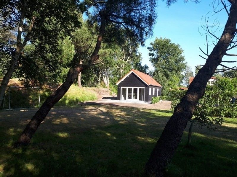 Freedom vacation home surrounded by nature in Ouddorp, Goeree-Overflakkee, South Holland, a perfect escape.