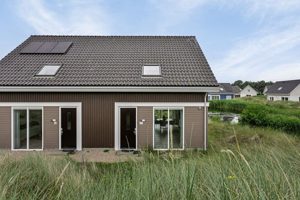 Reihenhaus in Ouddorp, Ferienhaus inmitten der Dnen in Ouddorp, Goeree-Overflakkee, Sdholland, mit natrlicher Umgebung.