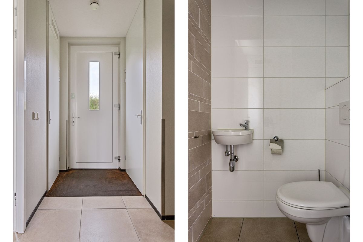 Gemtliches Wohnzimmer in Geschakelde woning in Ouddorp, Ferienhaus mit Blick auf die Natur in Ouddorp, Goeree-Overflakkee, Sdholland.