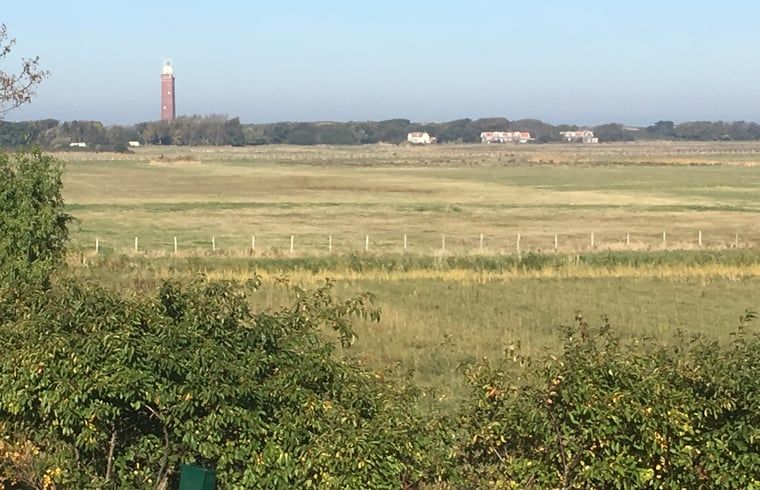 Landschap met vuurtoren nabij Vakantiehuis in Ouddorp, Goeree-Overflakkee, Zuid-Holland.