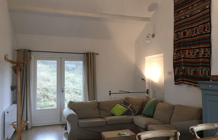 Comfortabele woonkamer in Vakantiehuis in Ouddorp, Goeree-Overflakkee, Zuid-Holland.