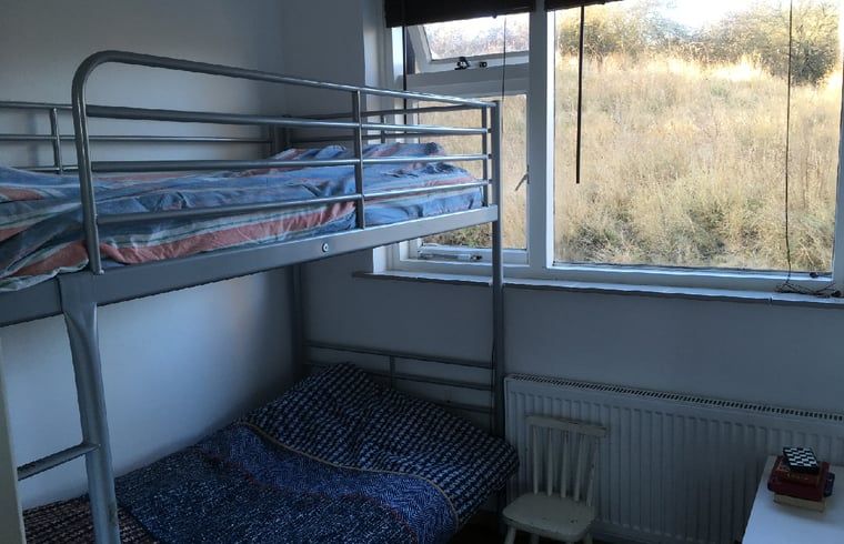 Stapelbed in kinderkamer van Vakantiehuis in Ouddorp, Goeree-Overflakkee, Zuid-Holland.