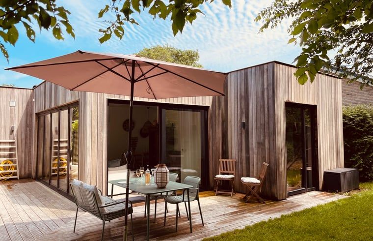 Cozy terrace of House in Ouddorp, vacation home in Goeree-Overflakkee, South Holland with modern look.