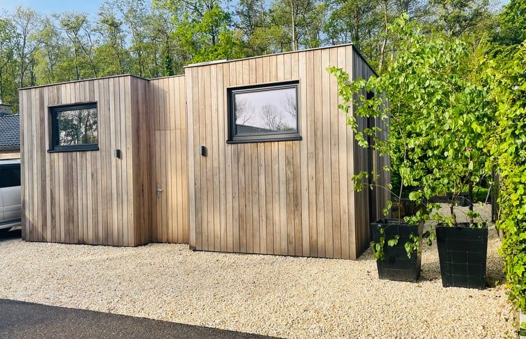 Exterior of House in Ouddorp, a vacation home in Ouddorp, South Holland surrounded by nature.