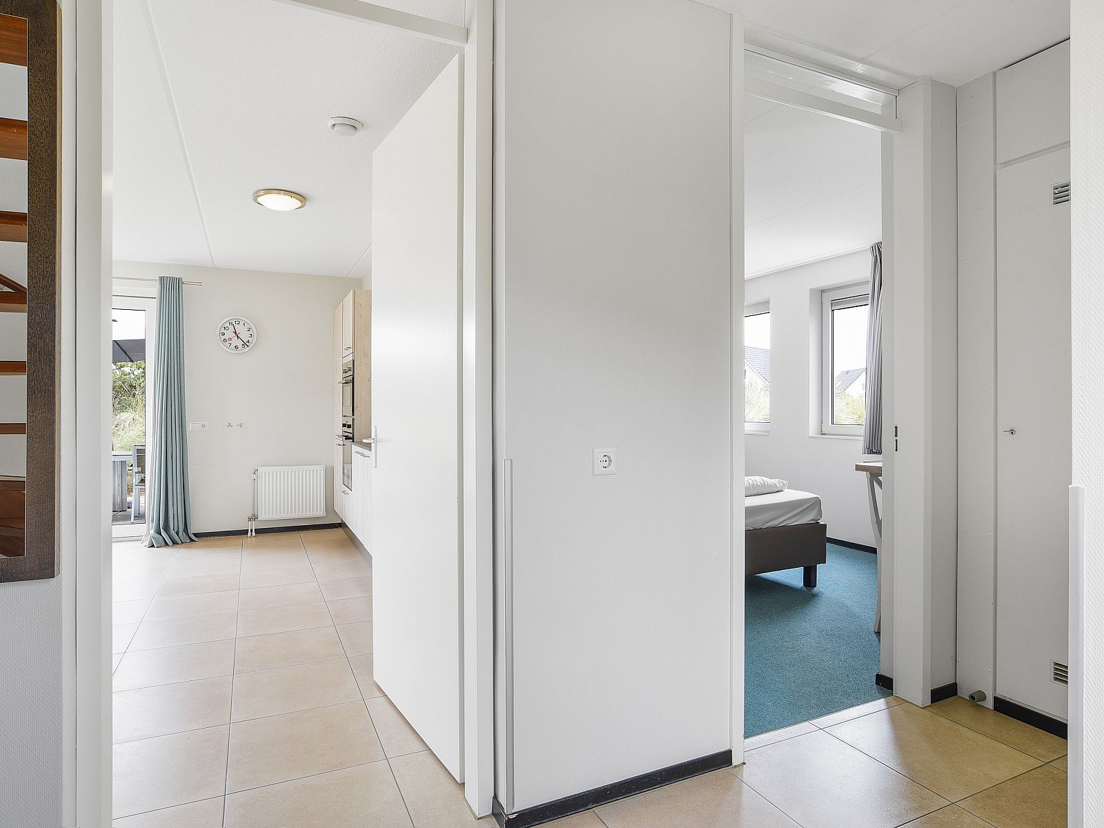 Stylish coffee table with wine in Strand Resort Ouddorp Duin, 10-person villa in Ouddorp.