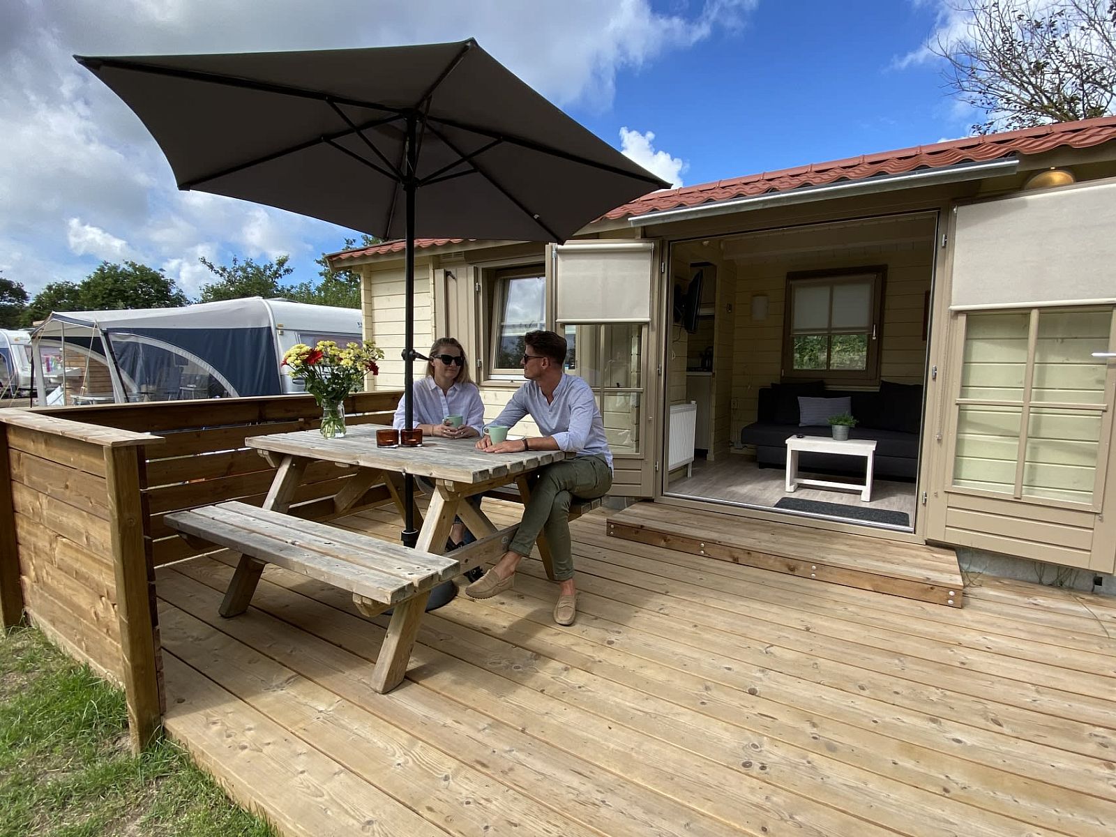 Modern bathroom in Camping Chalet the Albatros Plus, Ouddorp, South Holland, with wooden interior and comfortable amenities.