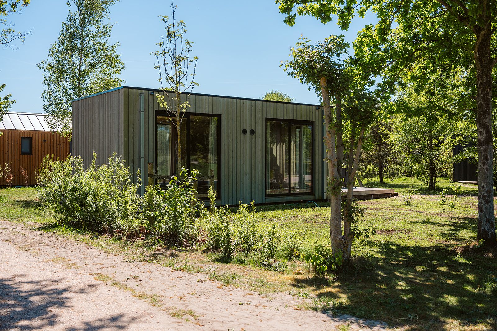 Duunroos vacation home in Ouddorp with sunny terrace and natural surroundings.
