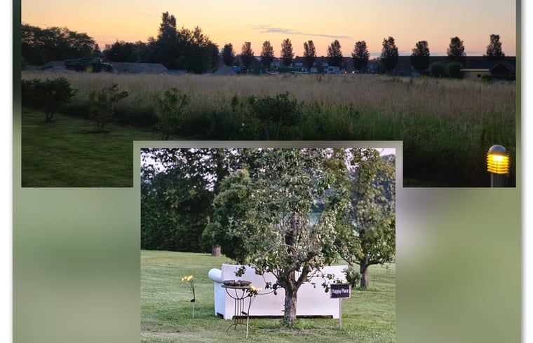 Abendlicher Garten im Ferienhaus in Sommelsdijk, Goeree-Overflakkee, Suedholland. Stimmungsvolle Beleuchtung fuer eine entspannte Atmosphaere.