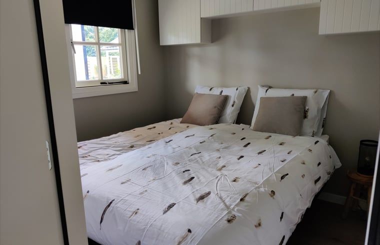 Comfortable bedroom in Holiday home in Nieuwveen, South Holland.