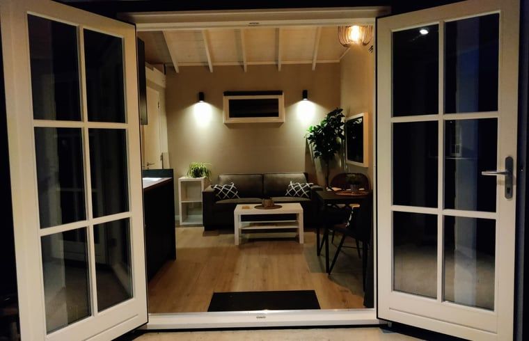 Atmospheric evening lighting in Holiday home in Nieuwveen, South Holland.