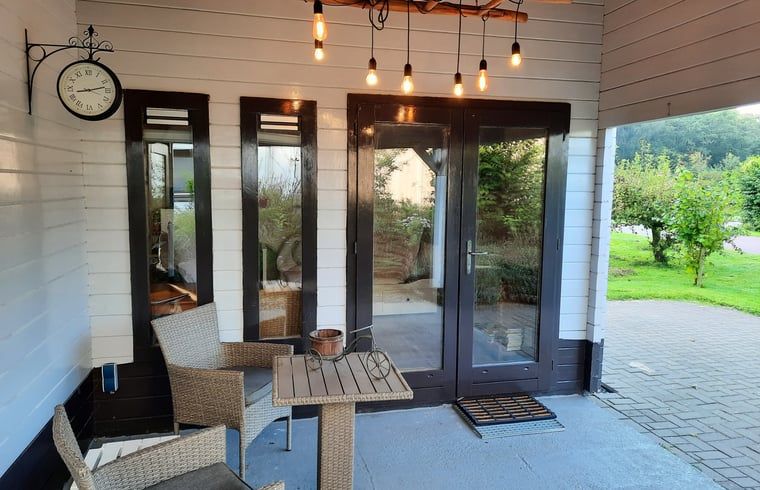 Cozy porch of Huisje in Lisse, vacation home on the North Sea coast in South Holland.