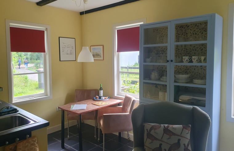 Dining area in Holiday home in Oostvoorne, perfect for cozy meals in South Holland.