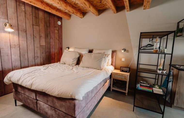 Schlafzimmer im Ferienhaus in Groesbeek mit bequemem Bett, Groesbeek, Rijk van Nijmegen, Gelderland.