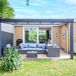 Relax on the terrace of Bungalow Duin aan Zee Texel in the picturesque Bungalowpark Tamarisk, De Cocksdorp.