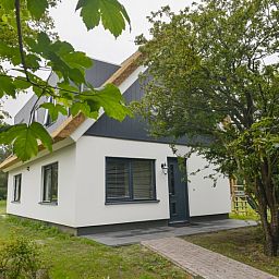 Vooraanzicht van De Postschipper vakantiewoning in De Cocksdorp, Texel, met charmante entree.