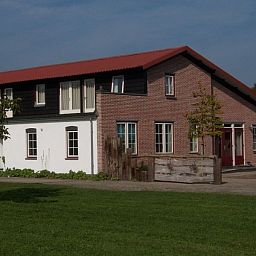 Buitenkant van Vakantiehuis Paal 86, charmant gelegen in De Cocksdorp, Texel.