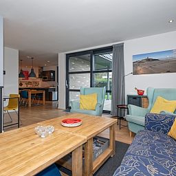 Atmospheric fireplace in the living room of Holiday home Slufteroord 240, Bungalowpark Slufteroord, De Cocksdorp.