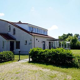Vacation home D 669 in De Cocksdorp, Texel offers a spacious terrace and green surroundings for a relaxing stay on the Wadden Islands.