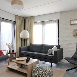 Stijlvolle woonkamer van Vakantiehuis B 271 in De Cocksdorp, Texel, biedt comfort en rust op de Waddeneilanden.