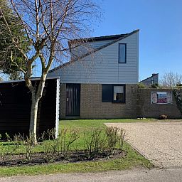 Vakantiehuis A 143 in De Cocksdorp, Texel. Moderne vakantiewoning met ruime tuin en zonovergoten omgeving op de Waddeneilanden.