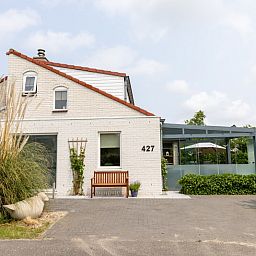 Vakantiehuis D 427 in De Cocksdorp, Texel. Charmant vakantiehuis met zonnig terras en groene omgeving op de Waddeneilanden.