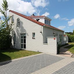 Vakantiehuis D 415 in De Cocksdorp, Texel biedt een charmant verblijf met een zonnige tuin en moderne architectuur op de Waddeneilanden.