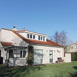 Vakantiehuis D 734 in De Cocksdorp, Texel, met ruime tuin en terras, ideaal voor een ontspannen verblijf op de Waddeneilanden.