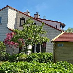 Ferienhaus D 657 in De Cocksdorp, Texel, umgeben von viel Gruen und Ruhe, ideal fuer einen erholsamen Aufenthalt auf den Watteninseln.