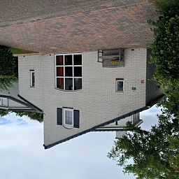 Vakantiehuis E 539, een charmant verblijf in De Cocksdorp, Texel, met uitnodigend terras en groene omgeving op de Waddeneilanden.