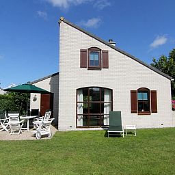Vakantiehuis E 638 in De Cocksdorp, Texel, met zonnig terras en groene tuin, ideaal voor ontspanning op de Waddeneilanden.