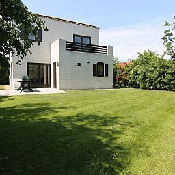 Vakantiehuis E 571 in De Cocksdorp, Texel, met ruime tuin en terras, ideaal voor ontspannen verblijf op de Waddeneilanden.