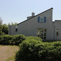 Vakantiehuis F 691 in De Cocksdorp, Texel, omgeven door groene natuur en rust, ideaal voor een ontspannen verblijf op de Waddeneilanden.
